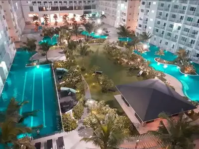 an aerial view of the pool at the resort at Chic Nordic Condo Unit at Shore Residences Mall of Asia in Manila