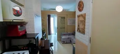 a room with a hallway with a kitchen and a door at Gabriel's Den @ JazzB1109 in Manila