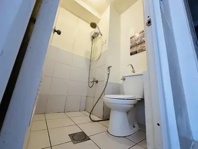 a bathroom with a toilet and a shower at Great View@Fully Equipped Condo w/ WiFi NETFLIX @the Metro in Manila