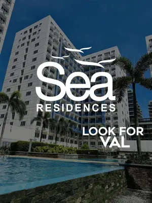 a building with a sign that reads sea residences at Sea Residences in Manila