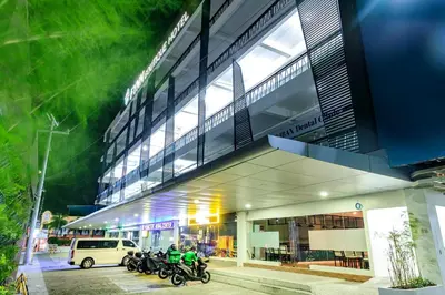 a group of motorcycles parked in front of a building at Fynn Boutique Hotel in Bacoor