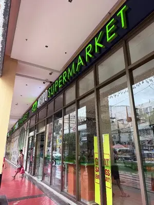 a store front of a supermarket with a sign on it at ZG-150Newport in Manila