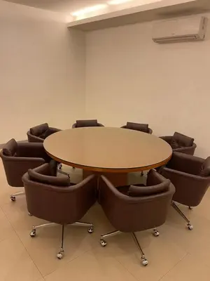 a conference room with a table and chairs at Wow Budget Hotel Cubao in Manila
