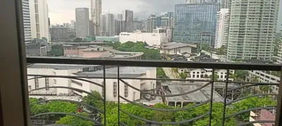 a view from a window of a city at 18F staycation in Manila