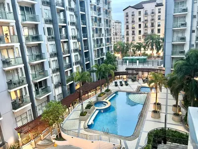 an overhead view of a swimming pool in a building at Luxury Hotel Type Condo Near NAIA Manila Airport in Manila