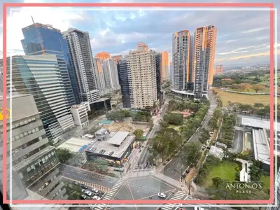 an aerial view of a city with tall buildings at Panoramic View of City 1BR Loft Unit FREE WIFI & NETFLIX at Fort Victoria BGC in Manila