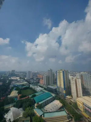 a view of a city with many tall buildings at Great Place at Beacon Tower Makati in Manila
