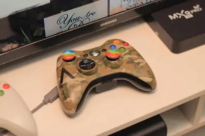 a video game controller sitting on a table at A2J BGC Luxury 2BR Loft Near Burgos Circle, Malls in Manila