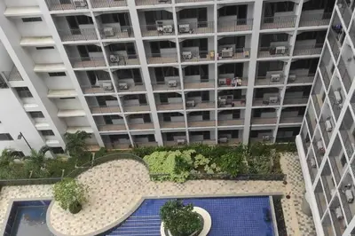 an overhead view of an apartment building with a swimming pool at MOA Shore 2 1BR with Balcony WiFi Netflix Pool 4Pax in Manila