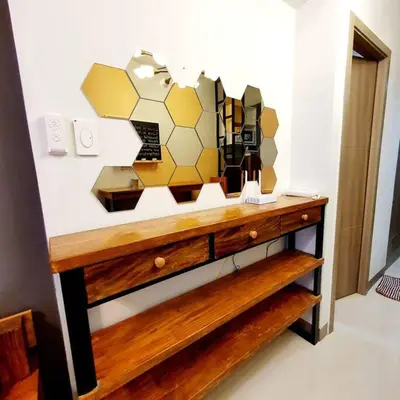 a bathroom with a counter with a mirror on the wall at S Residences MOA Condo Stunning Boutique Hotel Type T1 in Manila