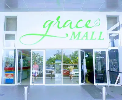 a store front with a large glass mall sign at Bethel House in Manila