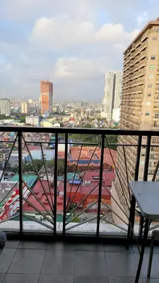 a view of a city from a balcony at MANILABAY HOME in Manila