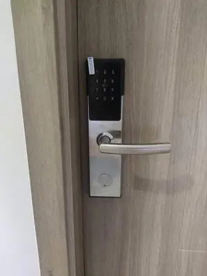 a close up of a door with a handle at Cozy Bedroom FAME Condo Greenfield EDSA MRT Shaw in Manila