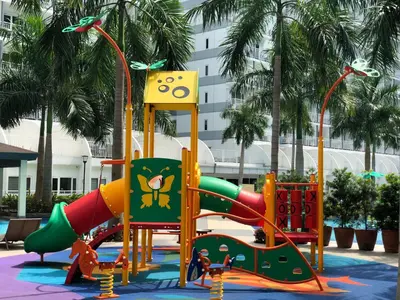 a playground at a resort with a slide at MOA CONDOTEL MANILA in Manila
