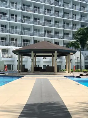 a large pavilion in front of a large building at MOA CONDOTEL MANILA in Manila