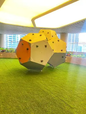 a yellow and orange object on the floor of a room at SMDC Air Residence-LucasCove Sorrento Vibes in Makati in Manila