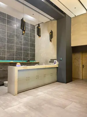 a lobby with a counter in a building at 1 bedroom Service Aprtmnt 2pax allows other 4pax 25011 in Cubao Quezon City in Manila