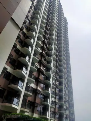 a tall building with balconies on the side of it at The Radiance Manila Bay in Manila