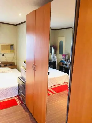 a closet in a bedroom with a bed at THE MANSION - 20 PAX LUXURY Near AIRPORT in PASAY in Manila