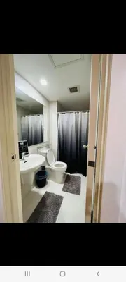 a bathroom with a toilet and a sink at AZURE URBAN RESORT Maldives tower in Manila