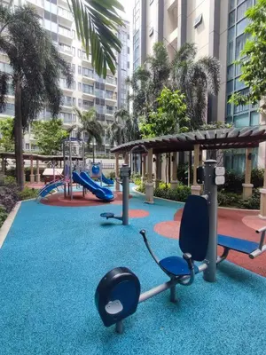 a playground with a slide and swings at TWO PALMTREE VILLAS NEWPORT BOULEVARD NEAR NAIA 3 PASAY CITY in Manila