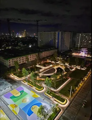 an aerial view of a city at night at Pandora's Nest in Manila