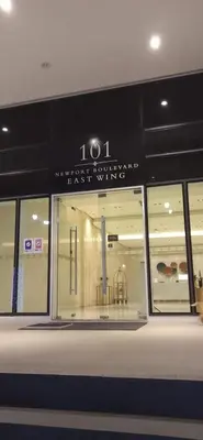 a store window with a sign on the front of it at 101 Newport Boulevard -Terminal 3 Airport in Manila