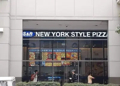 a new york style pizza sign in a building at 101 Newport Boulevard -Terminal 3 Airport in Manila