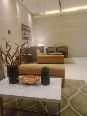 a living room with a couch and a table at 101 Newport Boulevard -Terminal 3 Airport in Manila