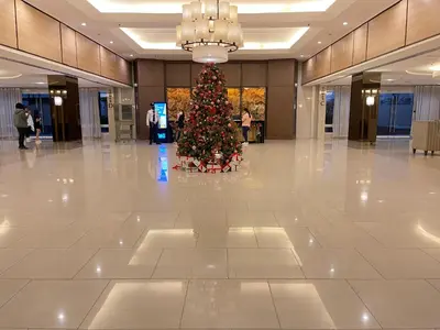 a christmas tree in the middle of a building at Amour Staycation Shell residences in Manila