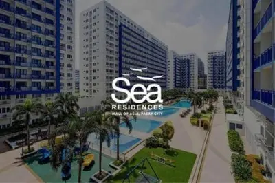 a view of a city with a resort at 5 Years Legit Staycation Infront of Moa, Moa Arena, Smx, Ikea, Sea Residences Tower A Near Dfa Macapagal, NU Moa, PICC, World Trade, Star City, Ayala Mall, Parqal Mall, NAIA 1,2,3 in Manila