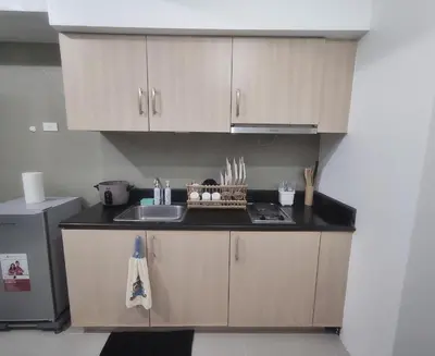 a kitchen with a sink and a counter top at Amazing Condo at SMDC Light Residences Boni Avenue Mandaluyong in Manila