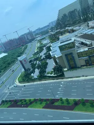 an empty street in front of a building with traffic at Le Maisse Executive Studio 1BR opp Okada in Manila