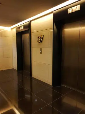 a hallway with the number on the wall at Awesome Value, Great Location in Manila