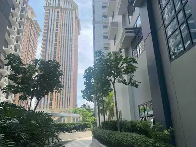 a view of a city street with tall buildings at 1BR Studio at viceroy McKinley taguig in Manila