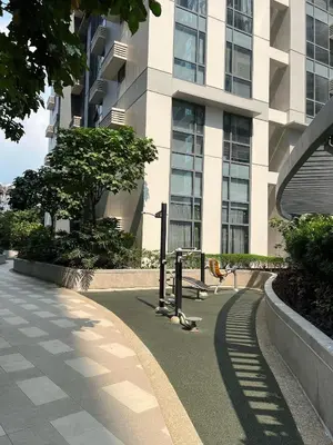 a sidewalk in front of a tall building at 1BR Studio at viceroy McKinley taguig in Manila