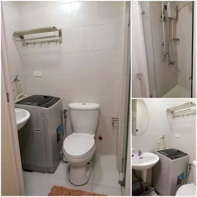 a bathroom with a toilet and a sink and a shower at Ronnzel staycation in Jazz Residence Makati in Manila