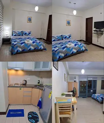 a kitchen and a bedroom with a bed and a table at RQUI CONDOTEL NEAR AIRPORT & Resorts World Manila in Manila