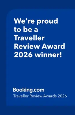 a blue sign that says were proud to be a traveller review avaraki at Jana@ShoreC2 in Manila