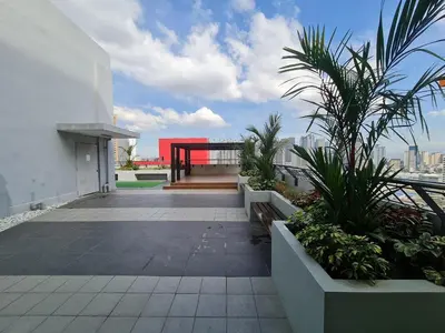 a balcony of a building with plants on it at U806 2Bedrooms PoolAccess Netflix wifi85mbps Karaoke in Manila