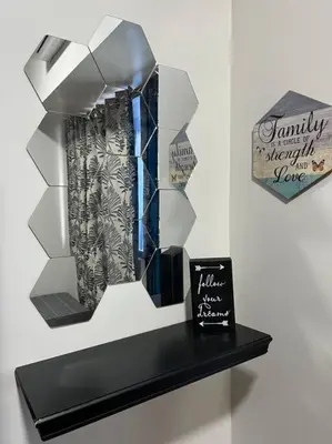 a shelf with a display of curtains and a sign at Air Residences - 1Bedroom Unit with Balcony - Wifi & Netflix in Manila