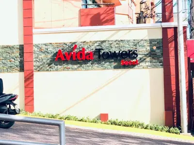 aania truck sign on the side of a building at Avida Tower Sucat, comfortable studio type in Manila