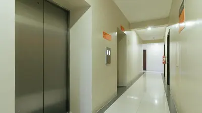a corridor of a building with a hallway at RedDoorz Plus near Nakpil St Taft Avenue in Manila