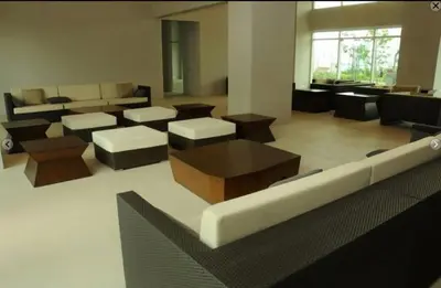 a living room with couches and tables and a couch at Beacon Makati Condo Free POOL Access FREE WIFI 100mbps & FREE Netflix in Manila