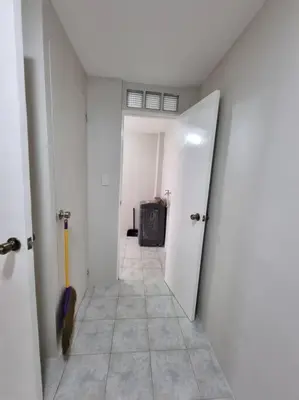 a hallway with an open door with an umbrella at #30 Bel Air House by Red Door House Rental in Santa Rosa