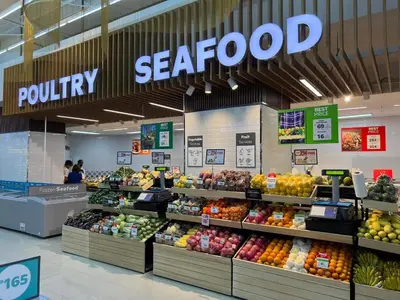 a produce section of a store with fruits and vegetables at Staycation by Ness in Ayala Makati in Manila