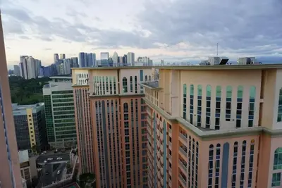 a view of a city with many tall buildings at Premium Executive Suite at Venice Luxury Residences in Manila