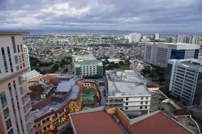 an aerial view of a city with tall buildings at Premium Executive Suite at Venice Luxury Residences in Manila