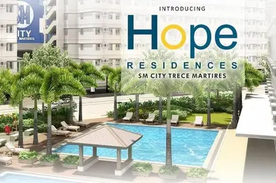 a magazine cover of a resort with a swimming pool at Staycation ni Inday in Trece Martires