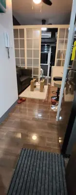 a view of a living room with a floor at SMDC AIR RESIDENCES in Manila